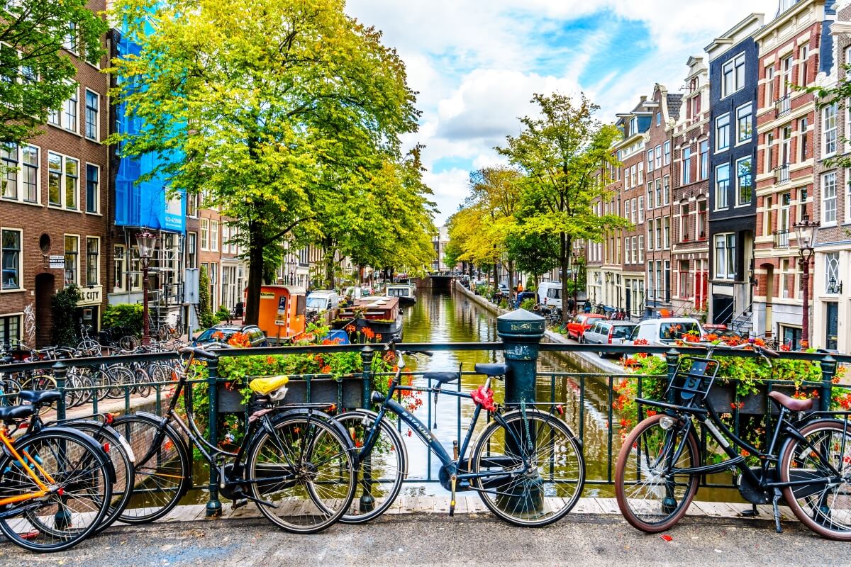Cycles on the streets of Amsterdam and beautiful canals